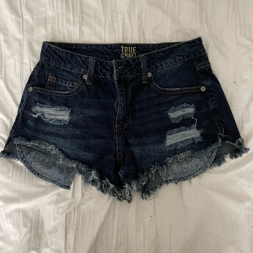 Distressed high rise denim shorts